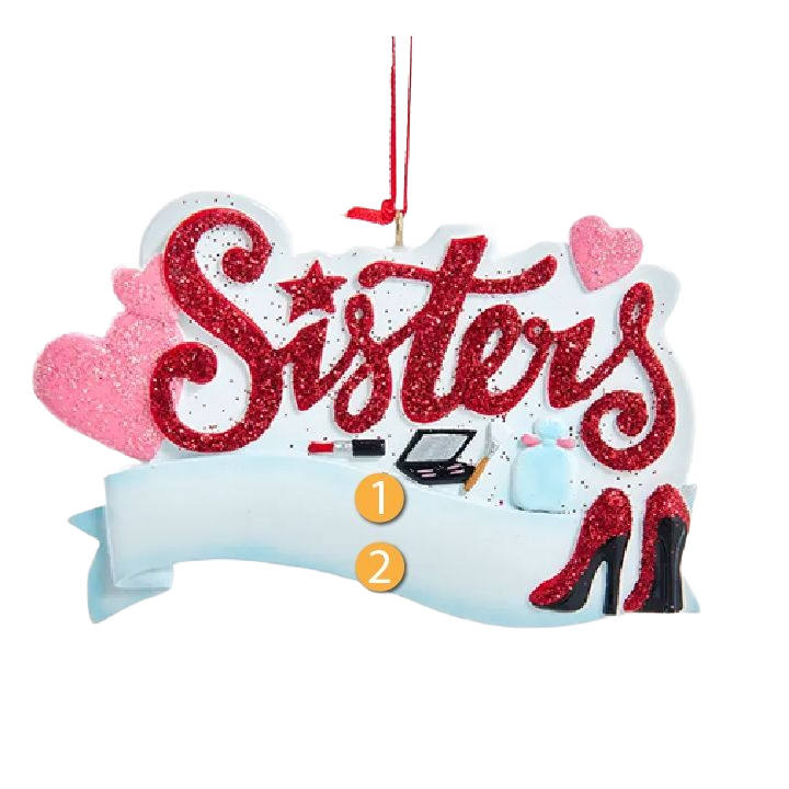 Red glitter "Sisters" Christmas ornament with hearts, makeup items, and high heel shoes in holiday decoration collection under $50