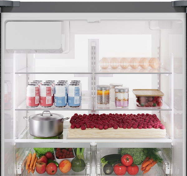 Open stainless steel French door refrigerator showing organized shelves with beverages, eggs, and fresh produce inside