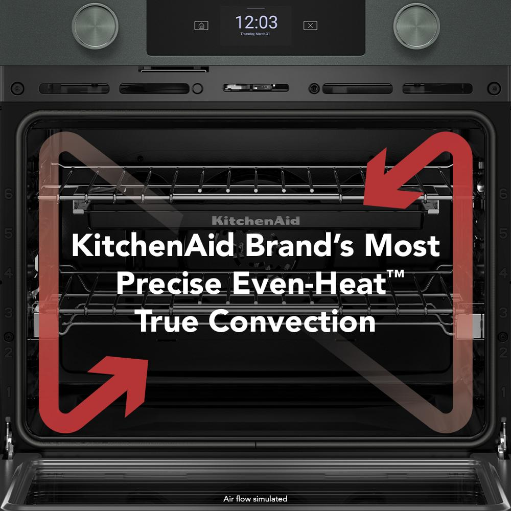 Open view of Juniper 30-inch smart electric combo wall oven showing convection airflow and digital control panel