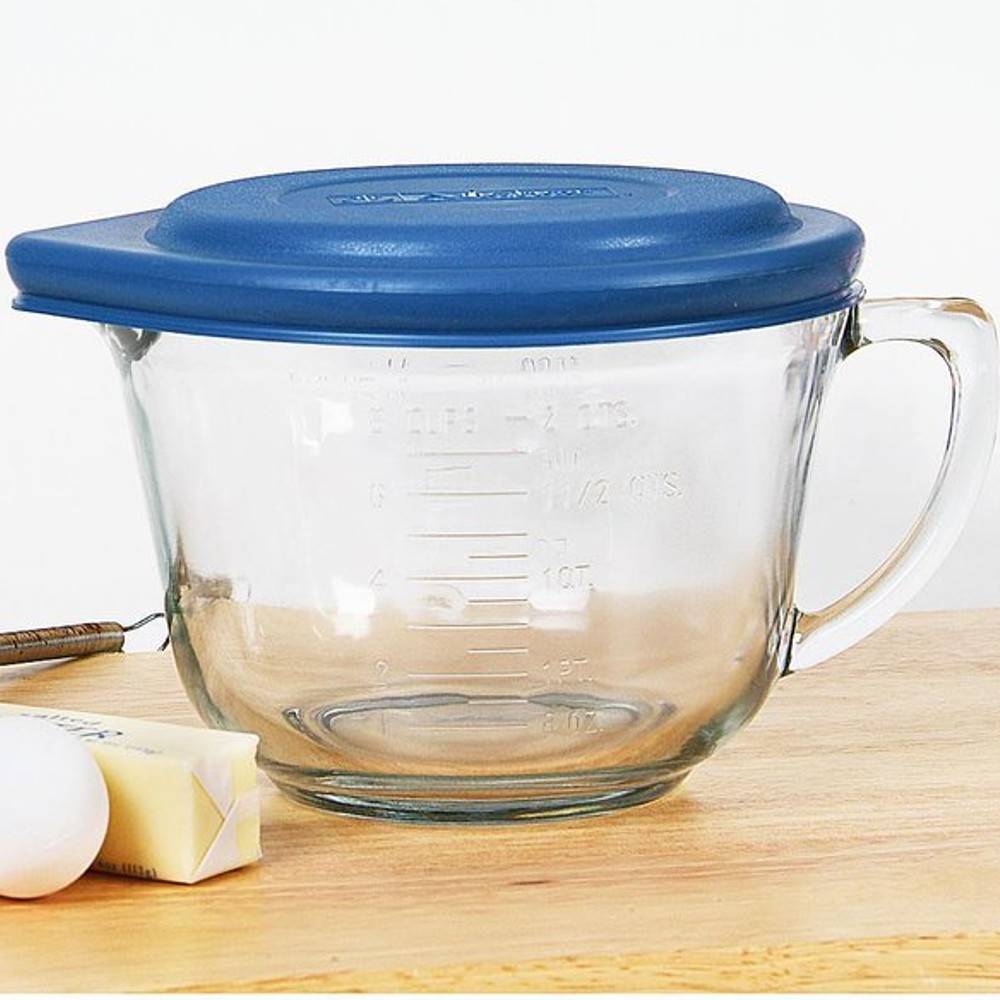 Clear glass batter bowl with handle and blue lid for kitchenware collections under $50 and kitchen essentials