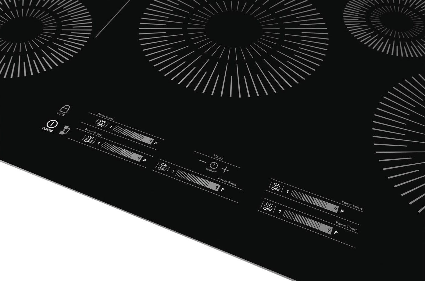 Close-up of black induction cooktop surface with touch controls and circular heating zones from kitchen appliances collection