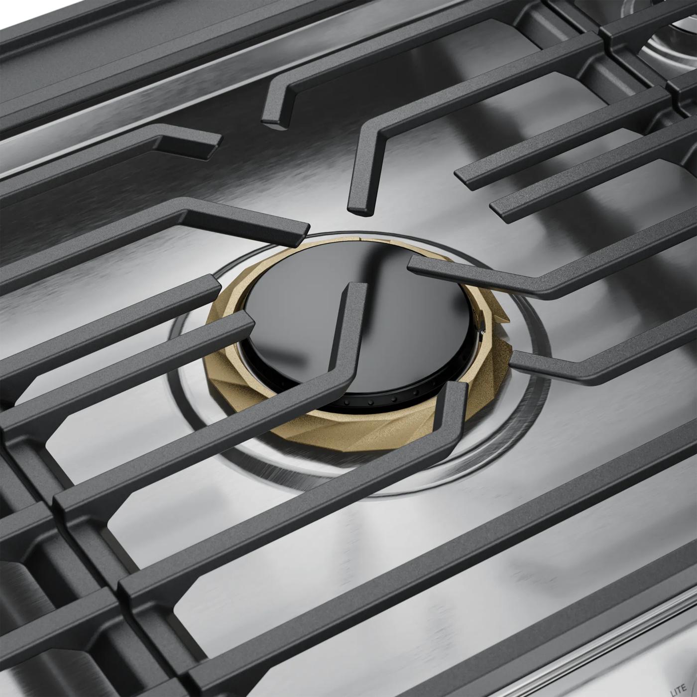 Close-up of a stainless steel gas burner with dishwasher safe grate on cooktops and kitchenware appliance collection