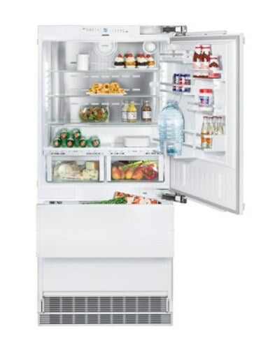 Open built-in refrigerator with right hinge, adjustable shelves, clear drawers, and bottom freezer in Appliances collection