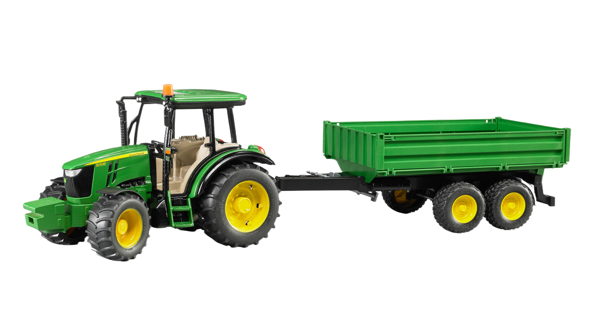 Green Bruder John Deere 5115M toy tractor with detailed cabin and matching green trailer for realistic farm play activities