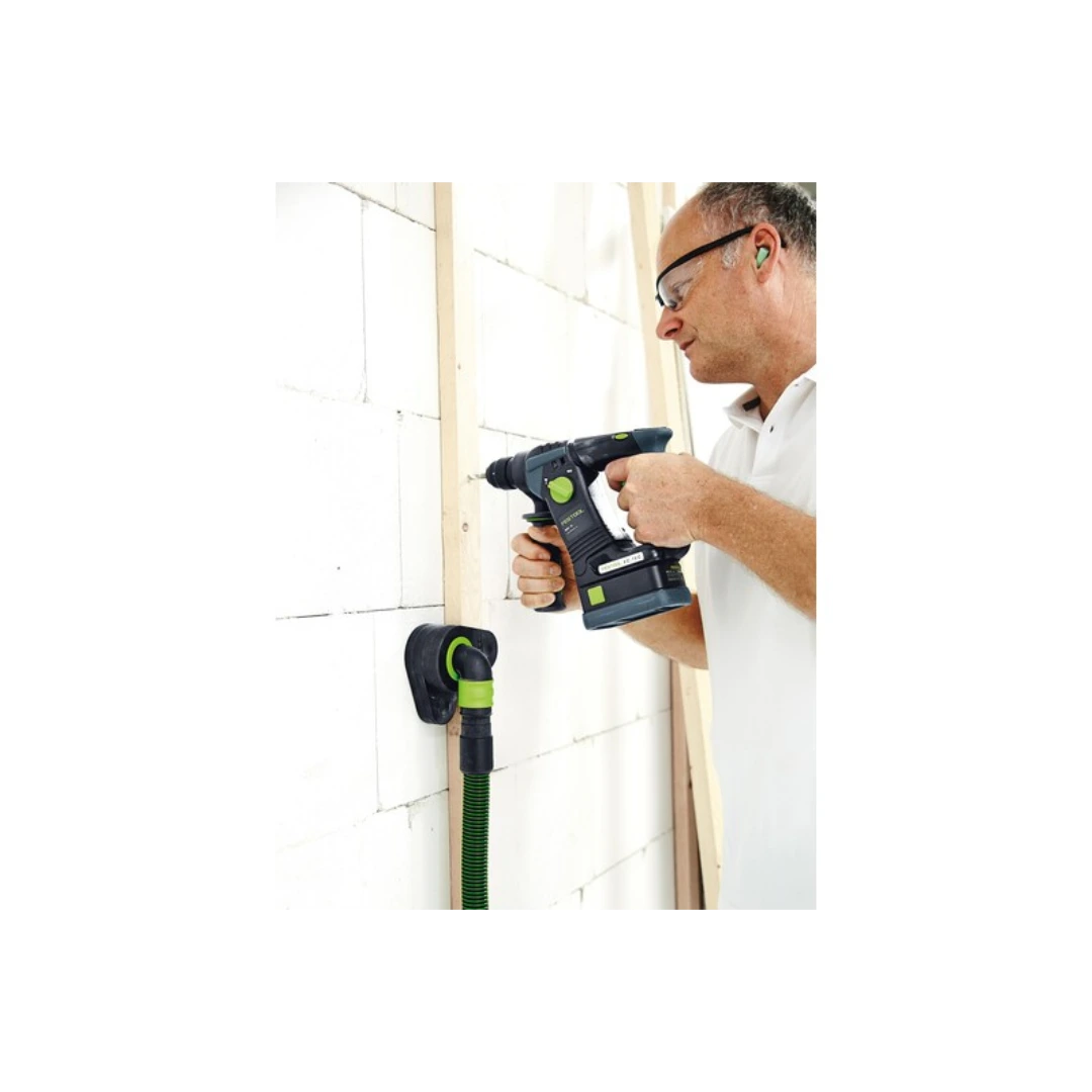 Man using Festool 500312 CT Wings Extra Hand with vacuum hose to secure tool on wall during home improvement project
