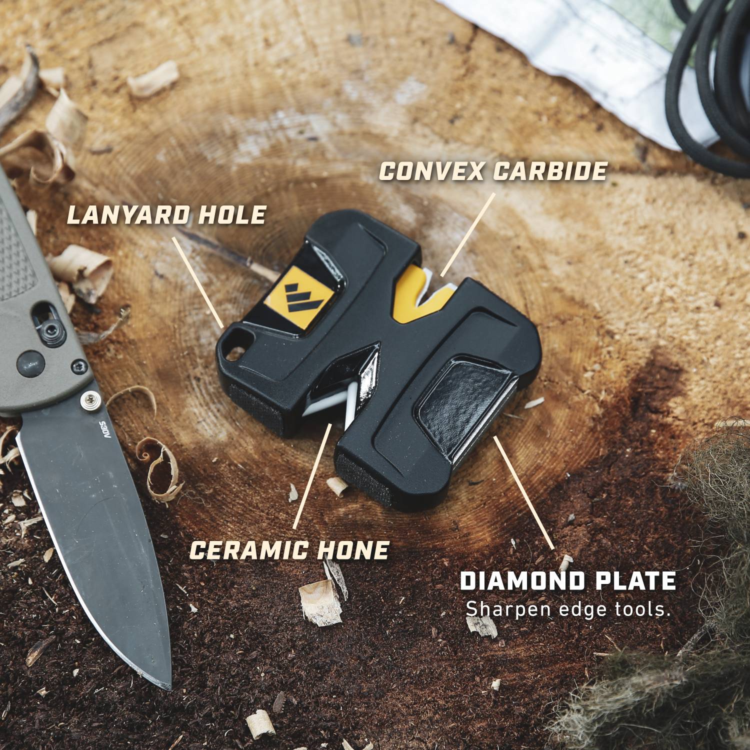 Compact black sharpening tool with convex carbide, ceramic hone, diamond plate, and lanyard hole for home improvement tasks