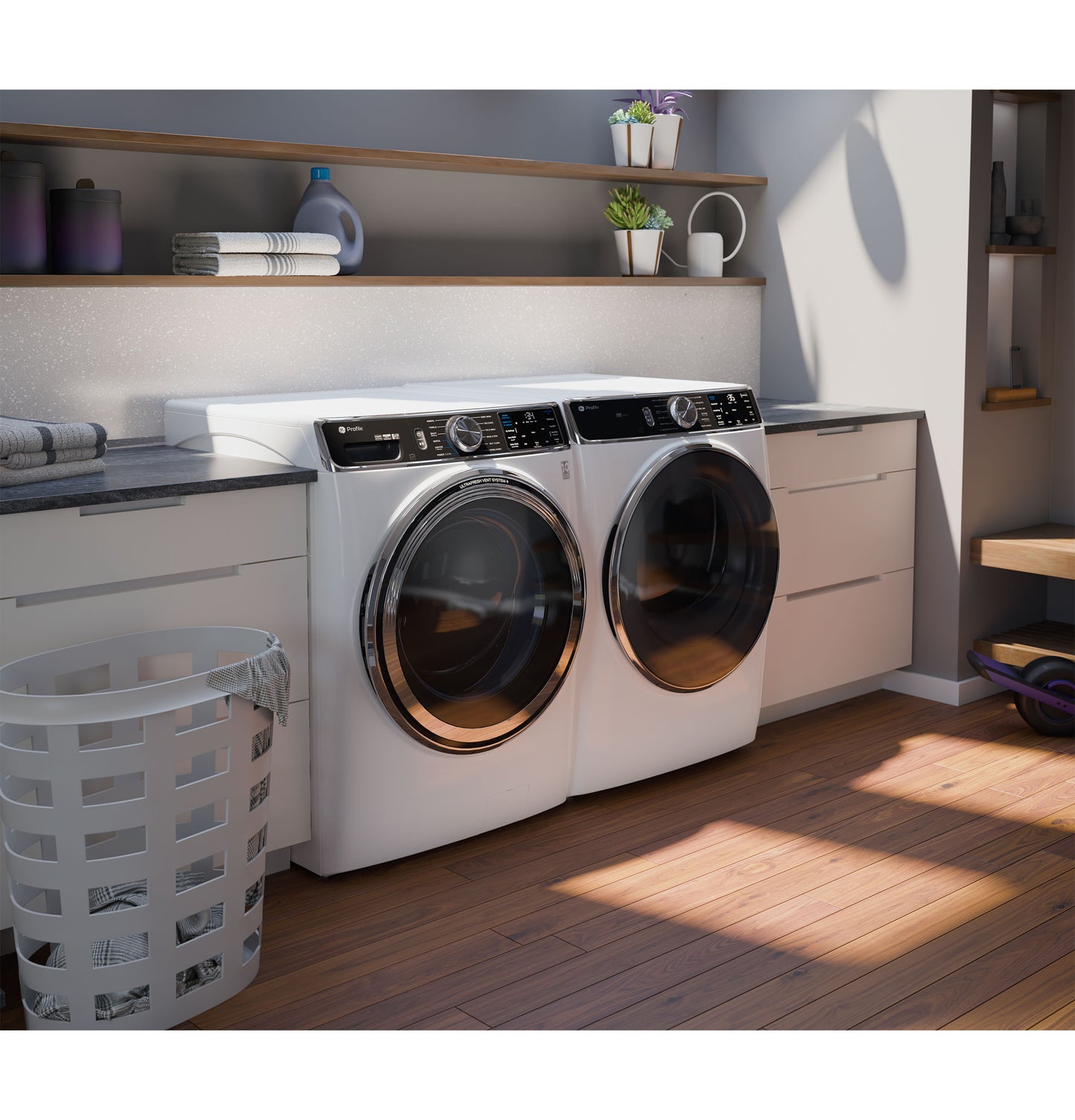 White smart front load washers with digital controls in a sunlit modern laundry room with wood flooring and white cabinetry