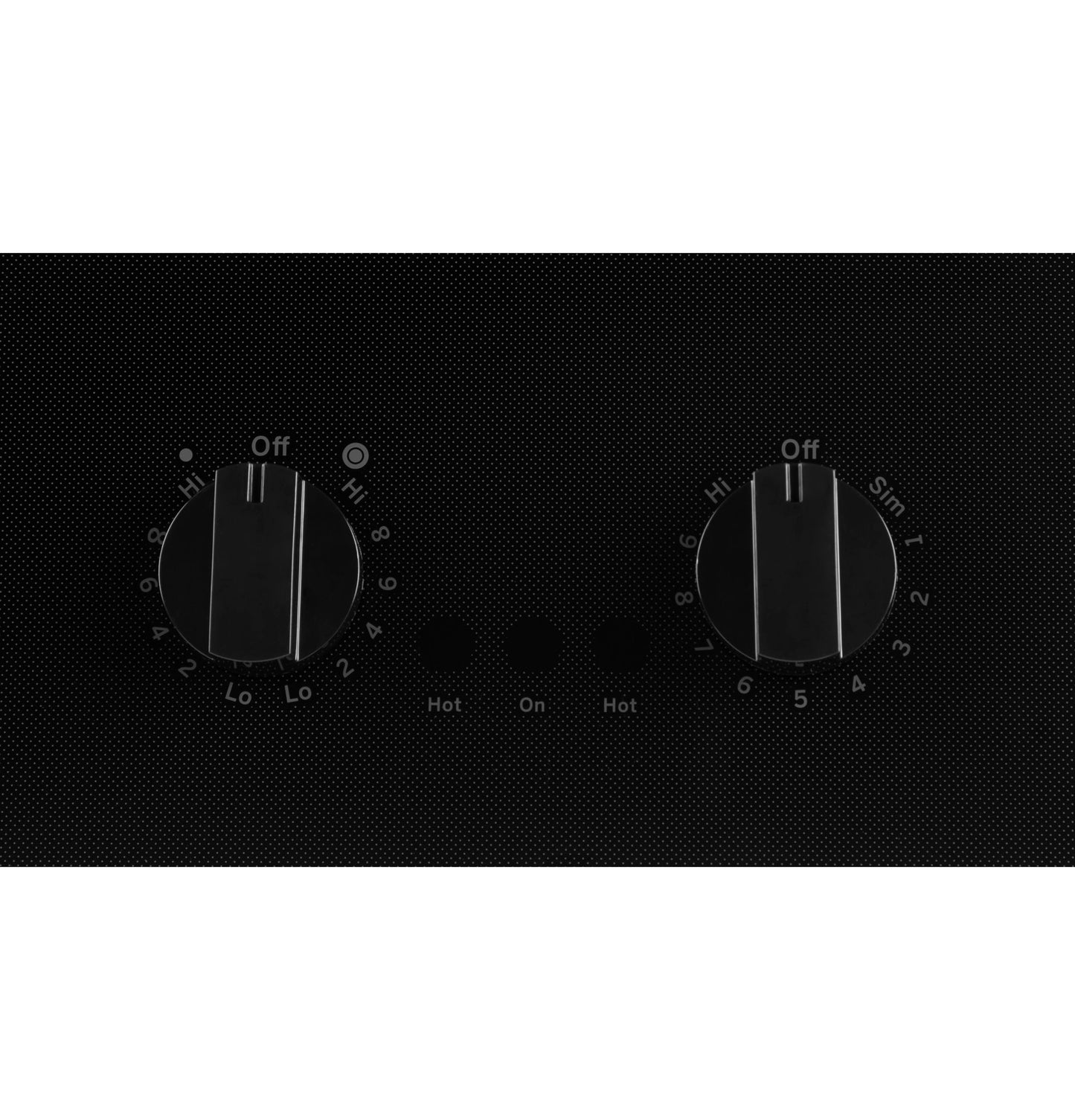 Close-up of black electric cooktop control panel with two rotary knobs and indicator lights in kitchen appliances collection