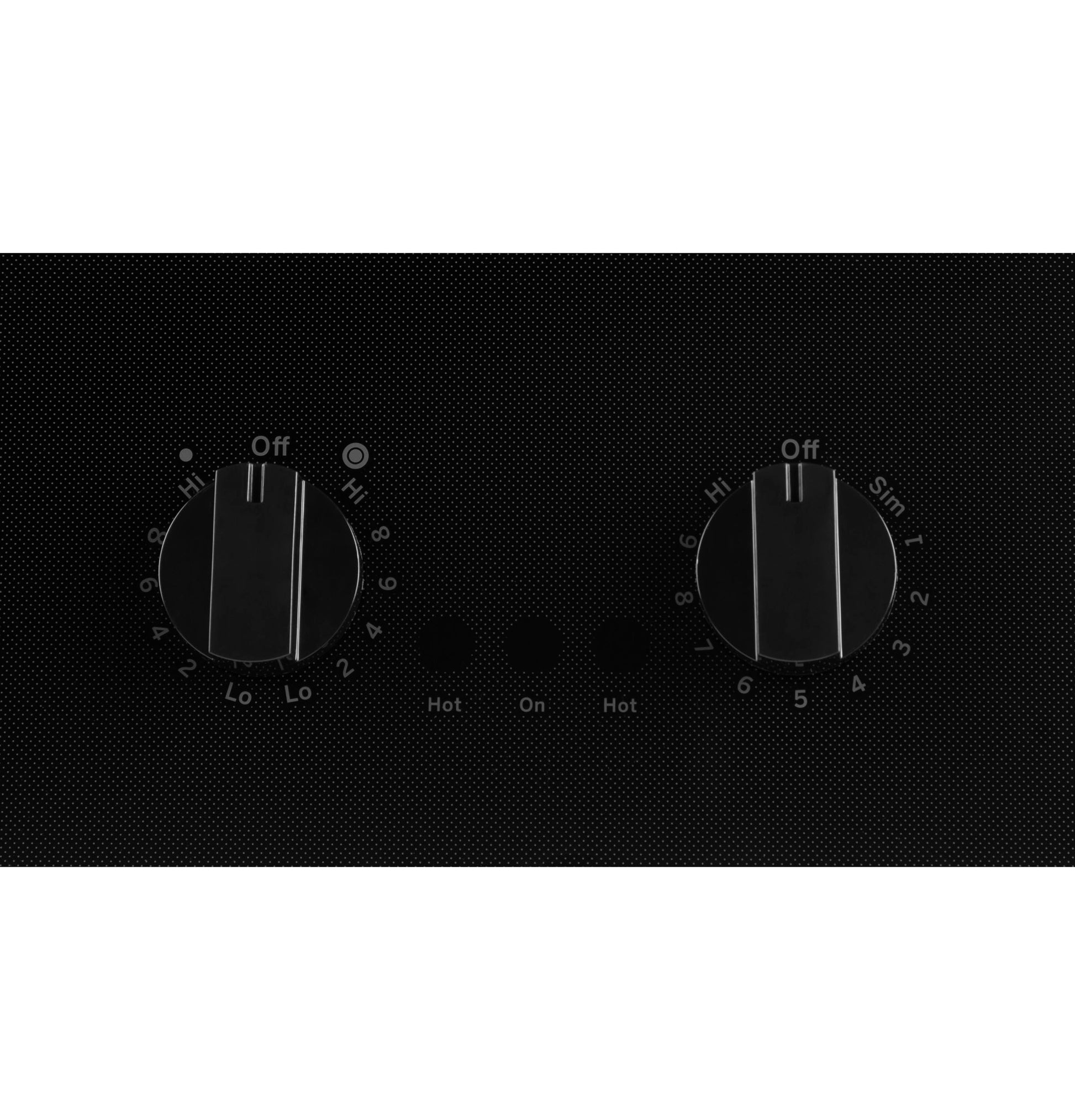 Close-up of black electric cooktop control panel with two rotary knobs and indicator lights in kitchen appliances collection