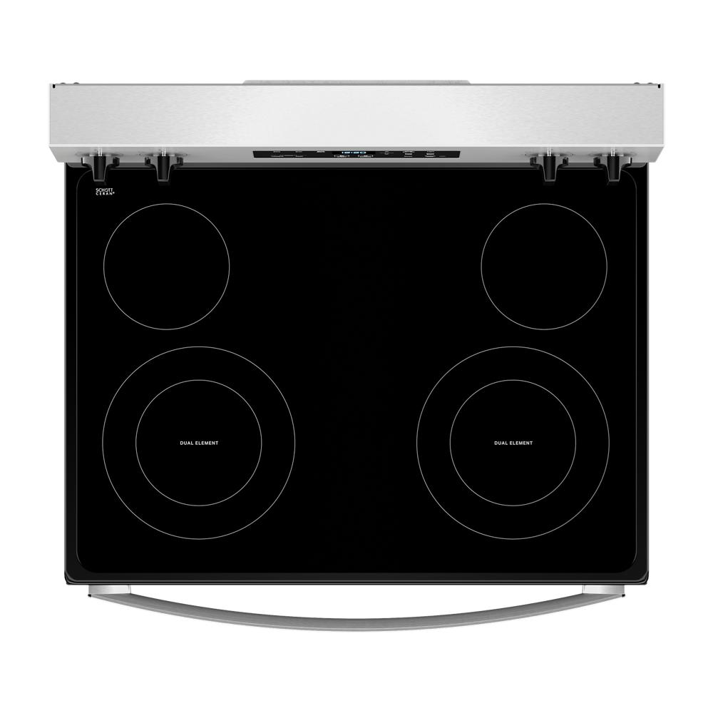 Top view of a black electric cooktop with four dual element burners and stainless steel trim in kitchen appliances category