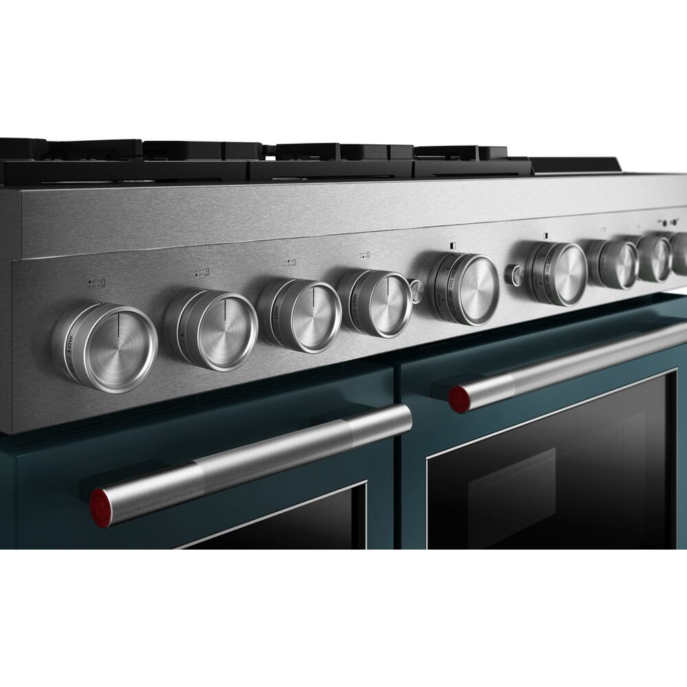 Close-up of stainless steel control knobs on blue dual fuel 48-inch range with electric double ovens for home kitchens