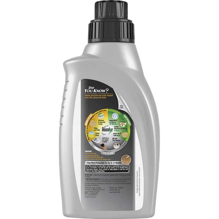 Gray container of concentrated weed and grass killer for effective lawn care and garden maintenance tasks