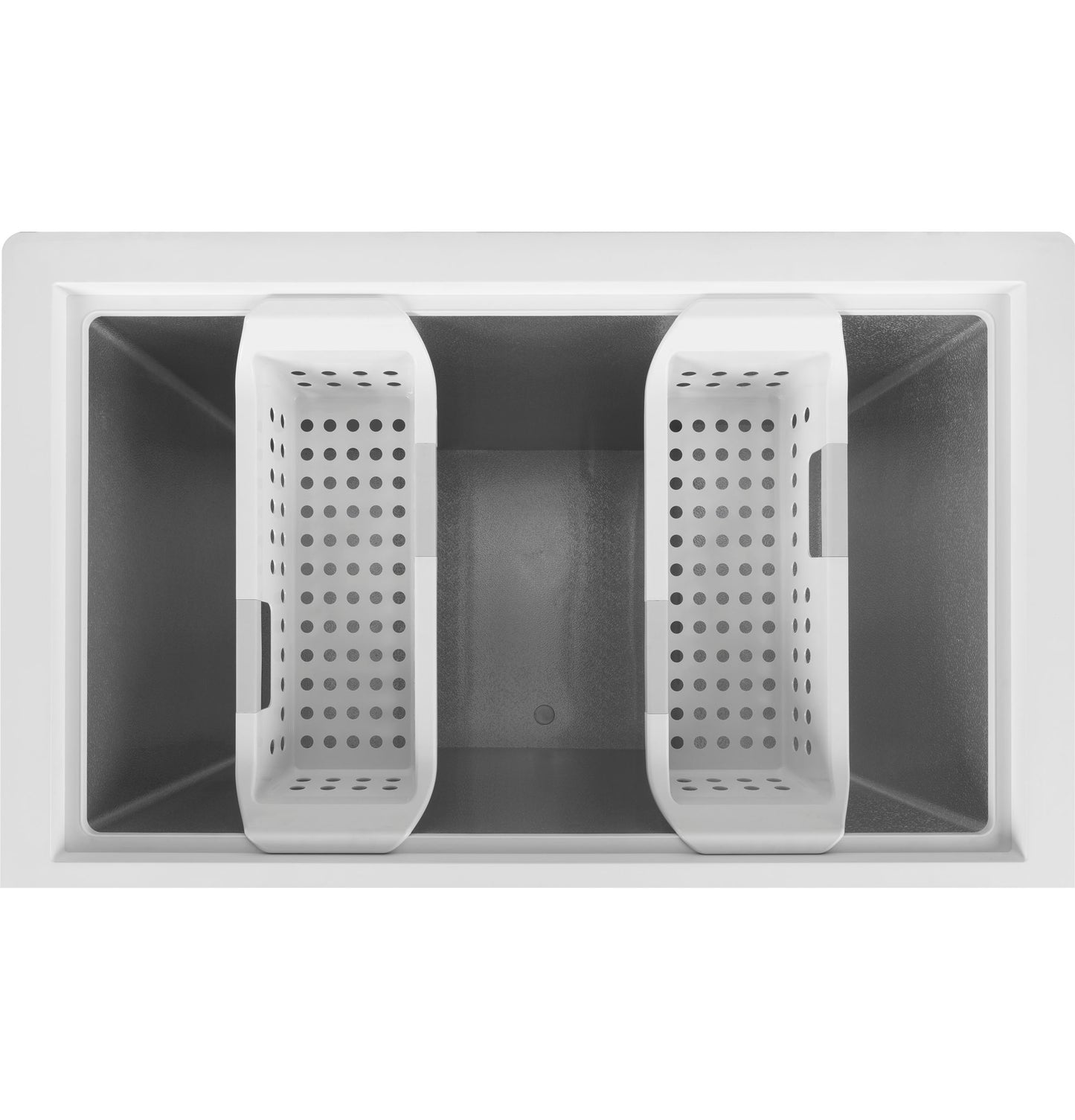 Top view of an empty white chest freezer interior with two removable perforated storage baskets for organized frozen goods
