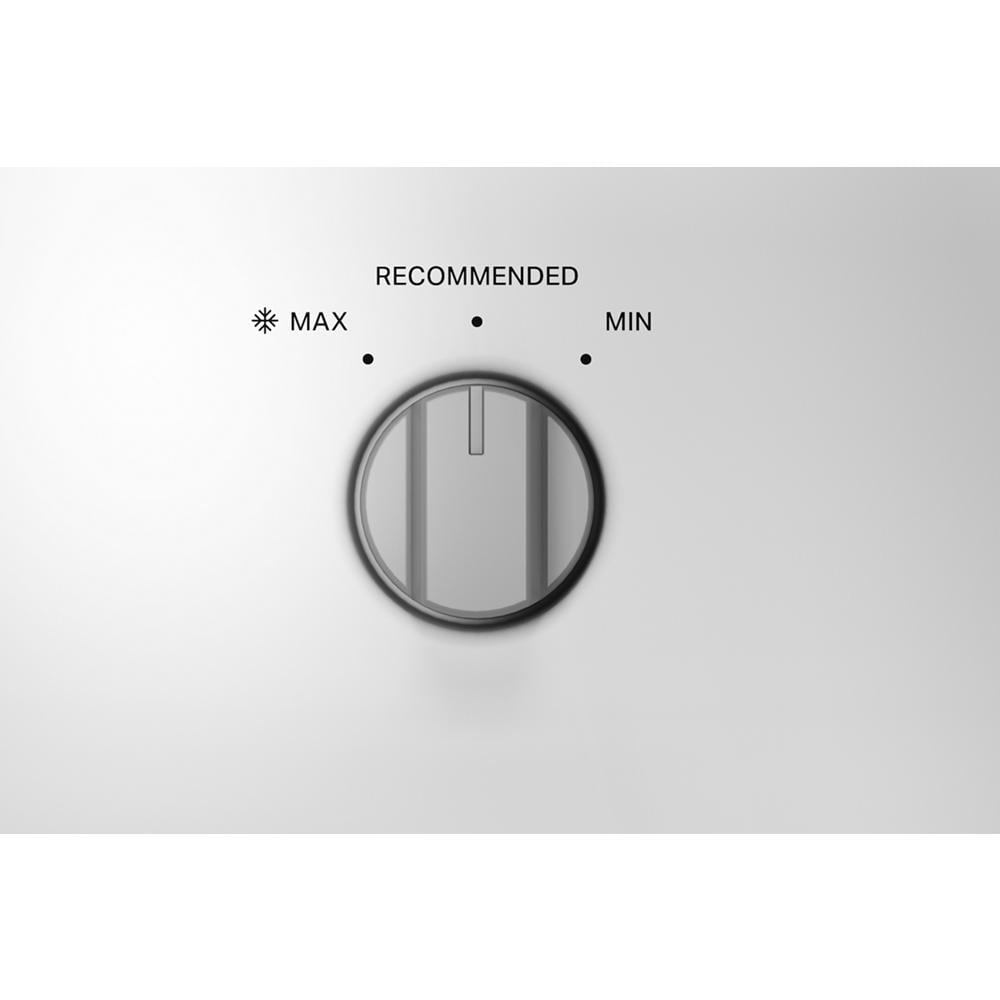 Close-up of temperature control dial with MAX, RECOMMENDED, and MIN settings on white appliance panel in kitchen appliance collection