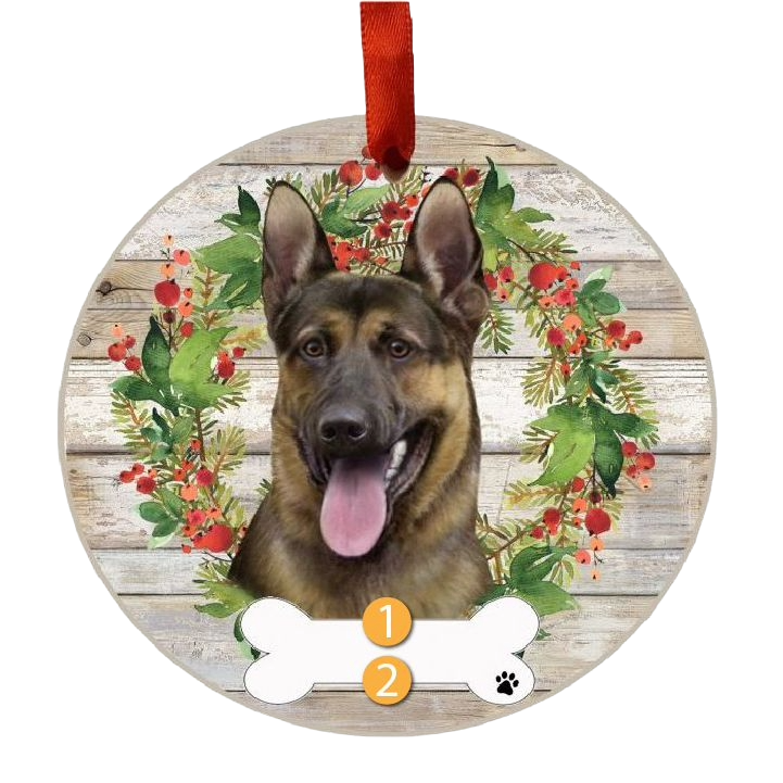 Round Christmas ornament featuring a German Shepherd’s face inside a festive holiday wreath on rustic wood background