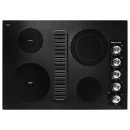 Black electric cooktop with four heating elements and integrated downdraft ventilation in Kitchen & Kitchenware collections