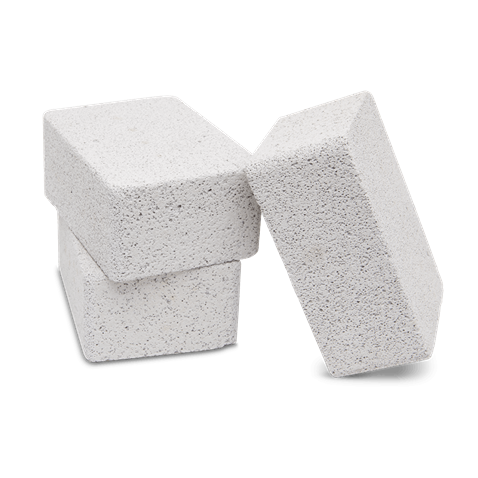 Three white porous griddle cleaning stones stacked for grill maintenance in outdoor living accessories collection