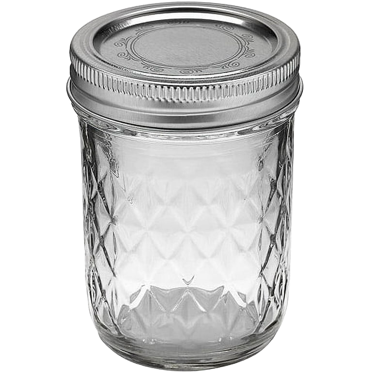 Clear glass jar with classic quilted pattern and silver metal lid in kitchenware and home canning collections