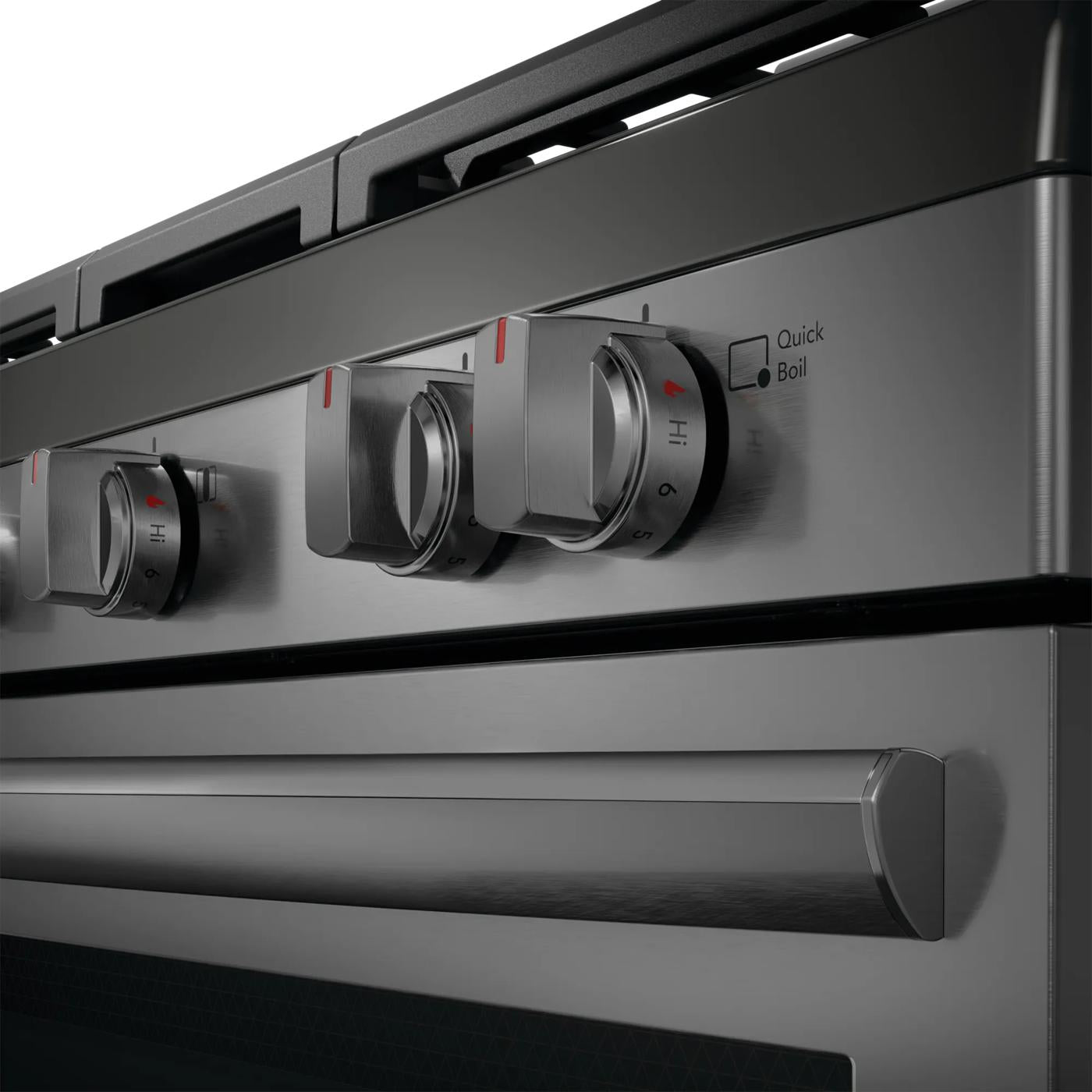 Close-up of stainless steel rear control knobs on gas range with Quick Boil setting in kitchen appliances collection