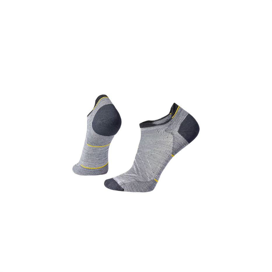 Pair of gray low-cut athletic socks with cushioned sole and yellow accent lines for running and casual wear