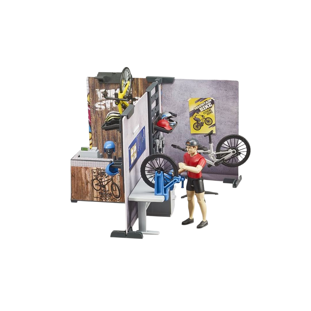 Toy bike shop playset with figure, bike repair stand, helmets, and bike posters in toys and games collection