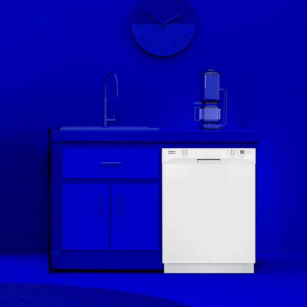 White front control built-in dishwasher installed beneath blue kitchen countertop with faucet and coffee maker from Appliances collection