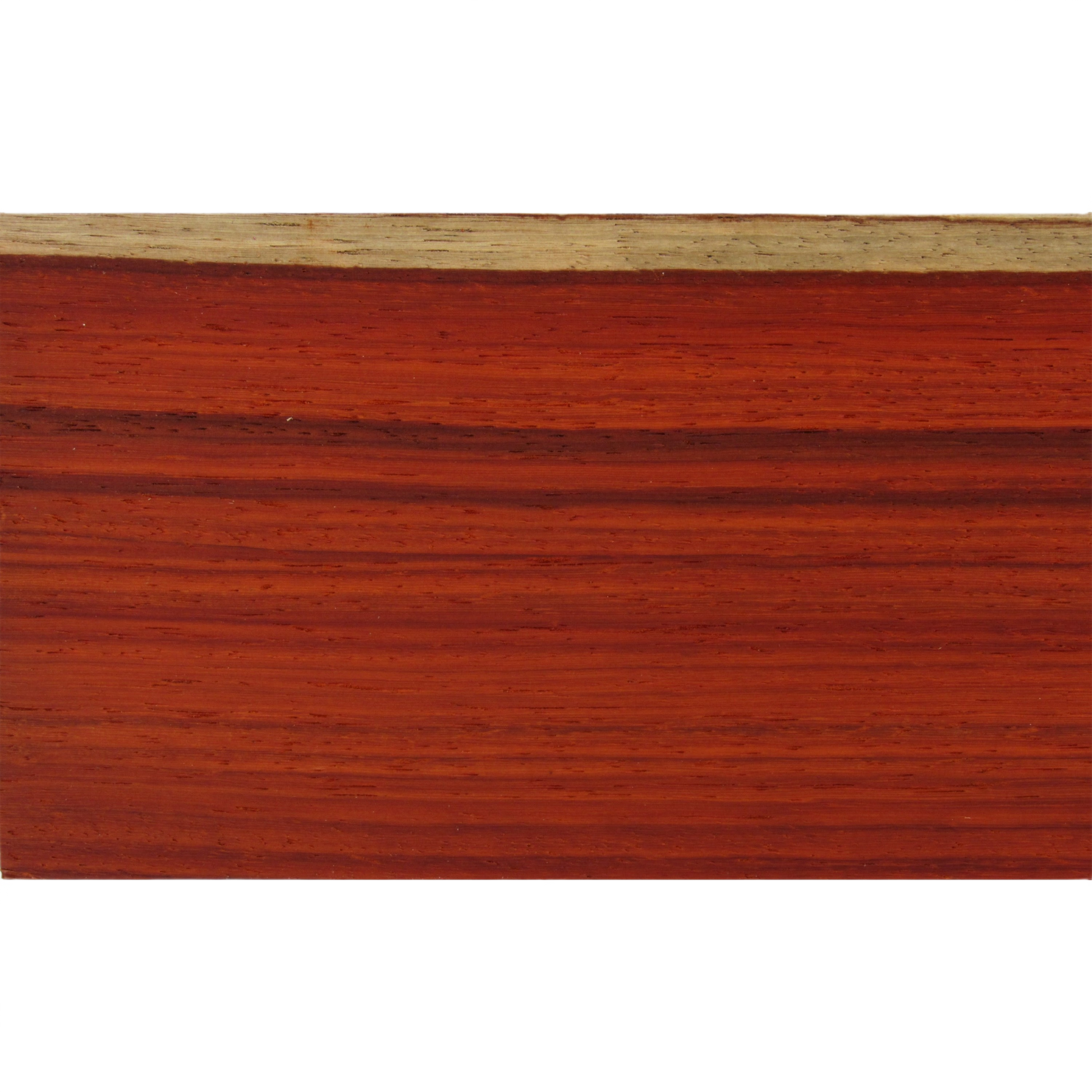 Close-up of smooth, reddish-brown African Padauk hardwood with natural grain patterns for woodworking and home improvement projects