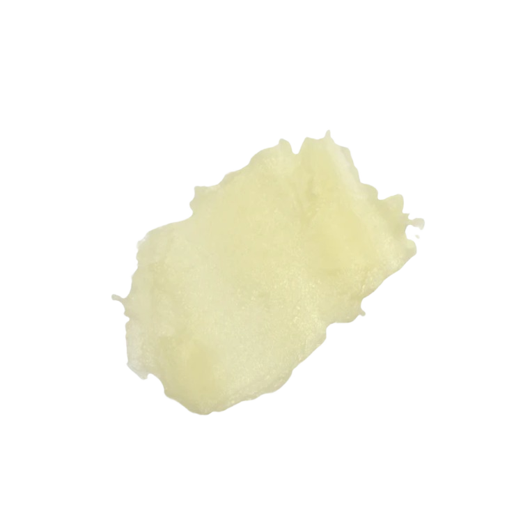 Swatch of smooth, colorless lip balm texture from a natural orange blossom honey SPF 15 skincare product