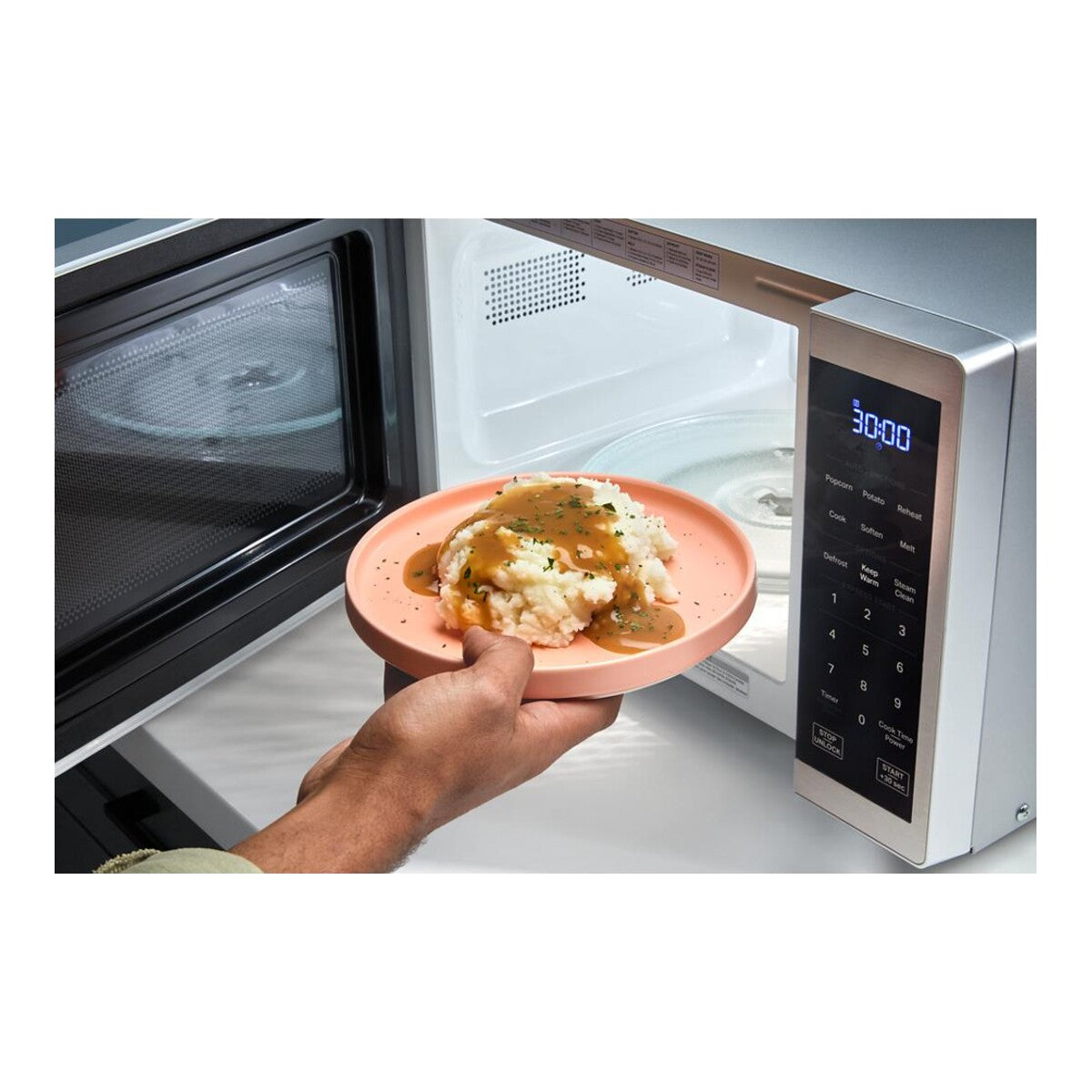 0.7 cu. ft. Black Countertop Microwave With Steam Clean - 700 watt