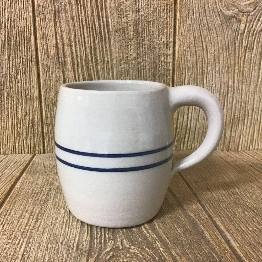Stoneware barrel mug with two blue horizontal stripes and rounded handle in drinkware and kitchenware collections