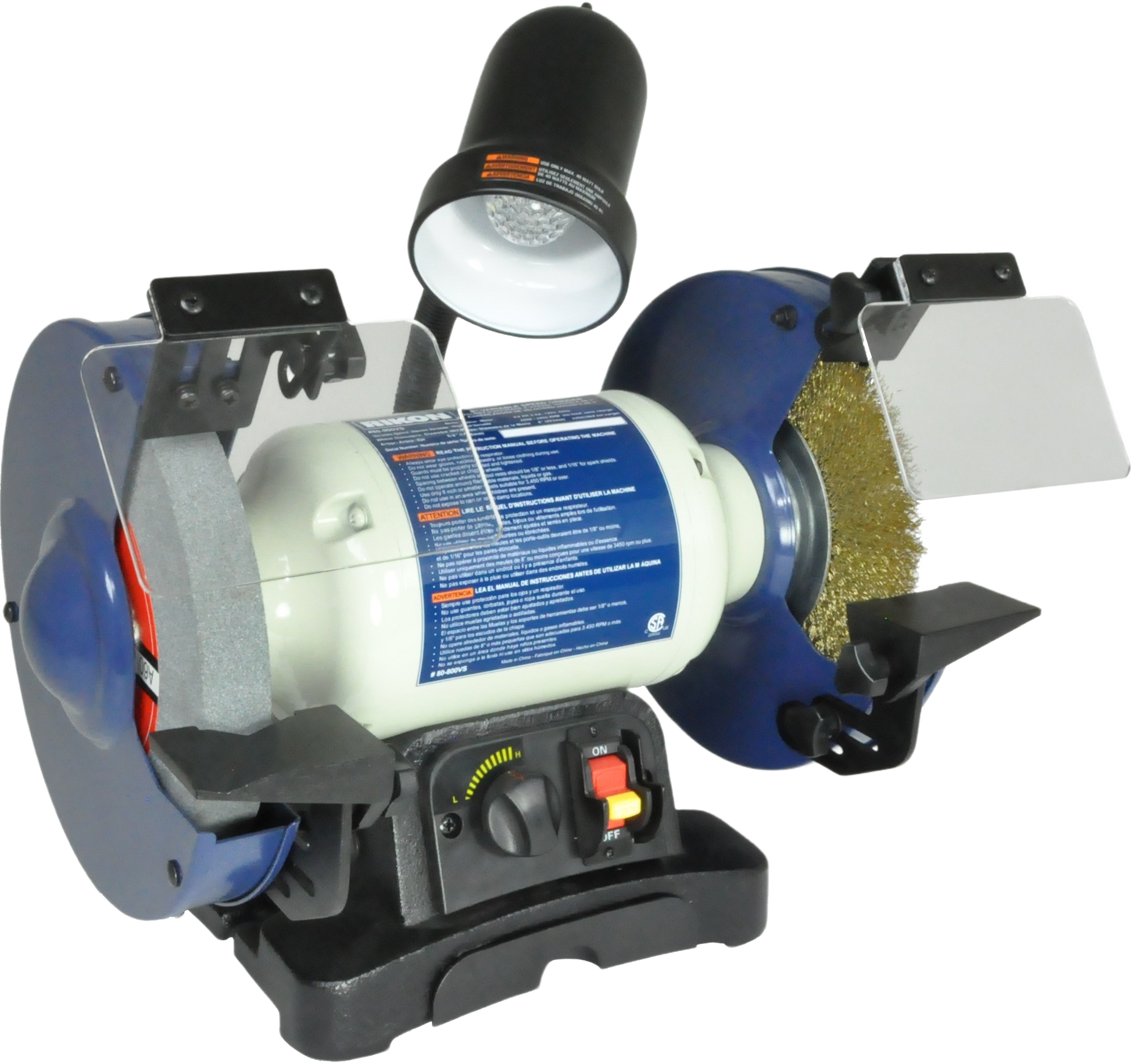 Bench grinder with adjustable tool rests, protective shields, and an integrated work light for home tool use