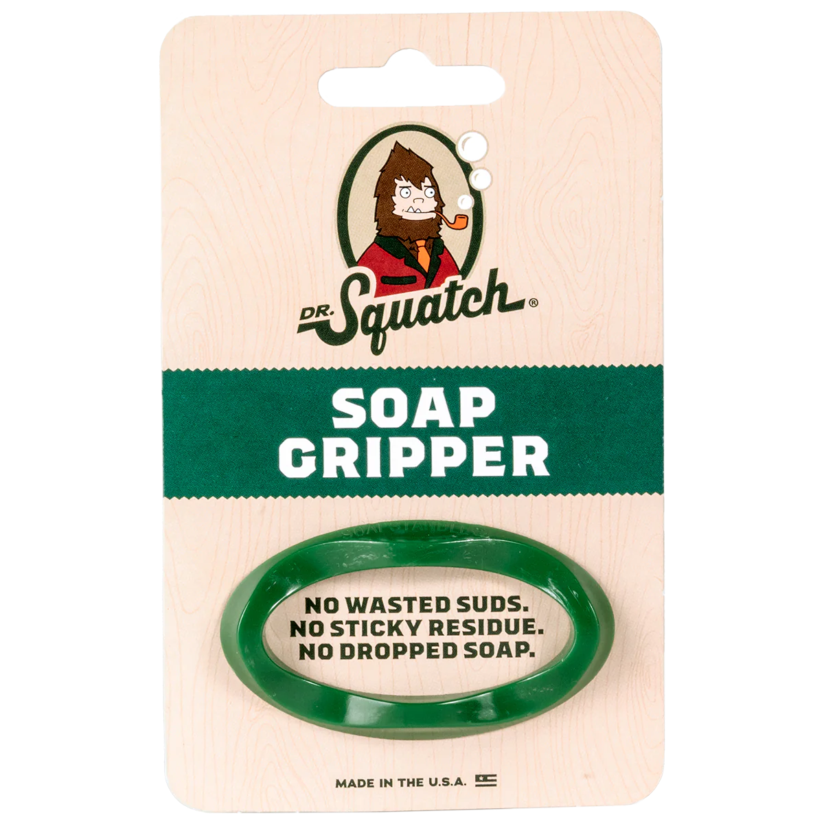 Green oval soap gripper accessory on beige packaging with logo, ideal for Health & Beauty and under $50 collections