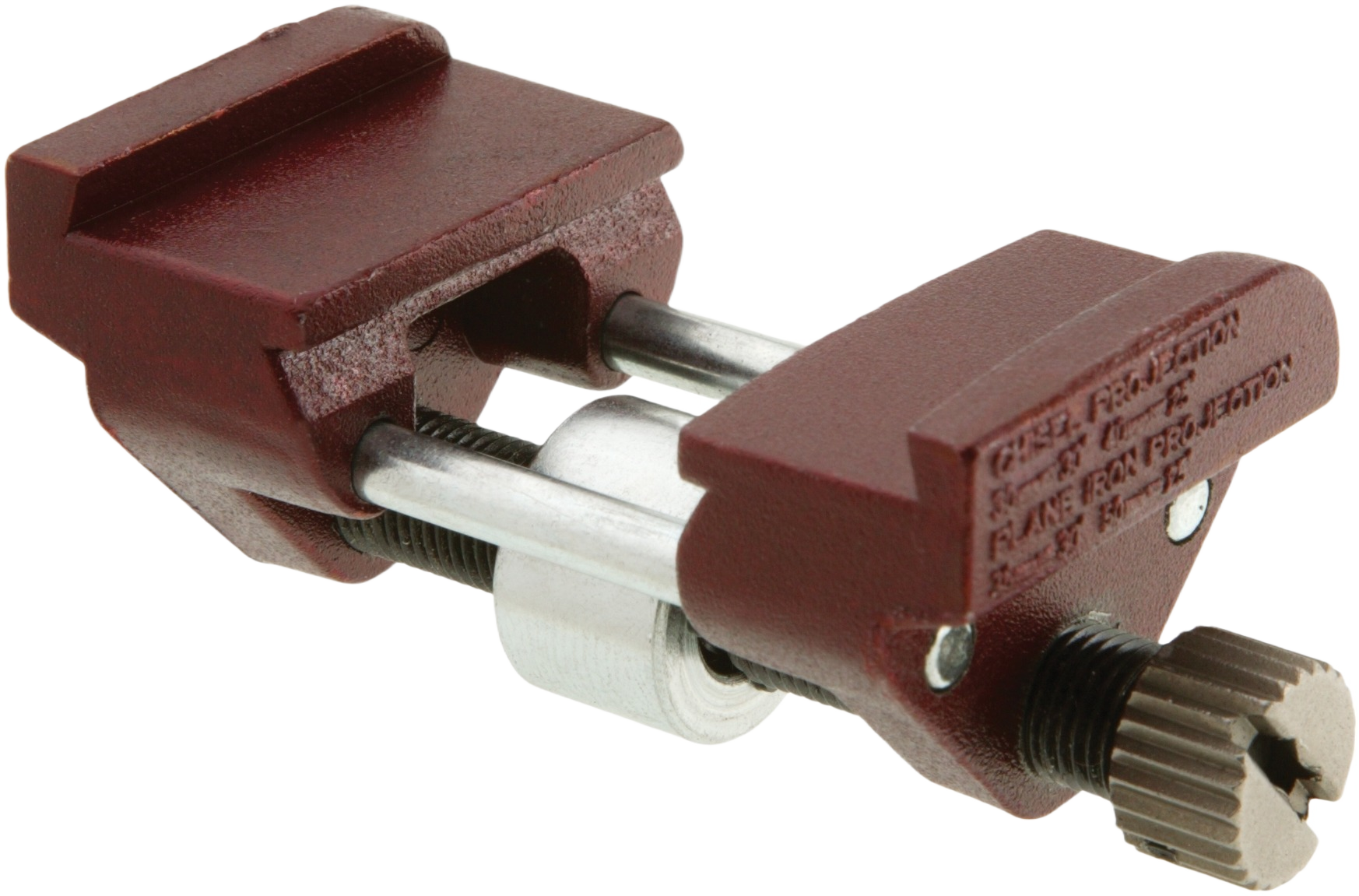 Compact honing guide with maroon cast iron body and adjustable steel rods for precise bevel sharpening in woodworking tools.