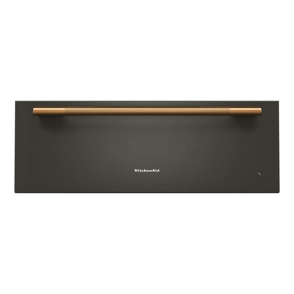 Front view of a sleek black warming drawer with bronze handle from KitchenAid in appliances category