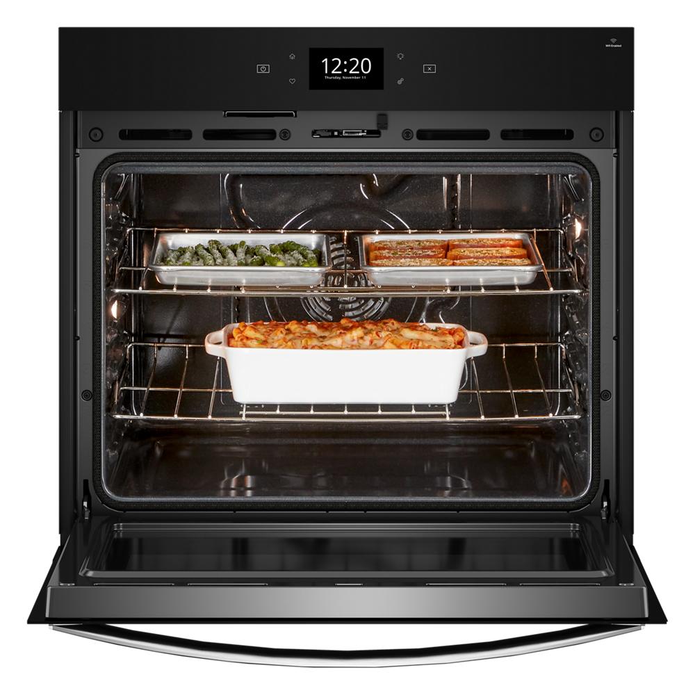Open smart oven with multiple dishes cooking inside, featuring digital display in Wall Ovens and Kitchen & Kitchenware collections