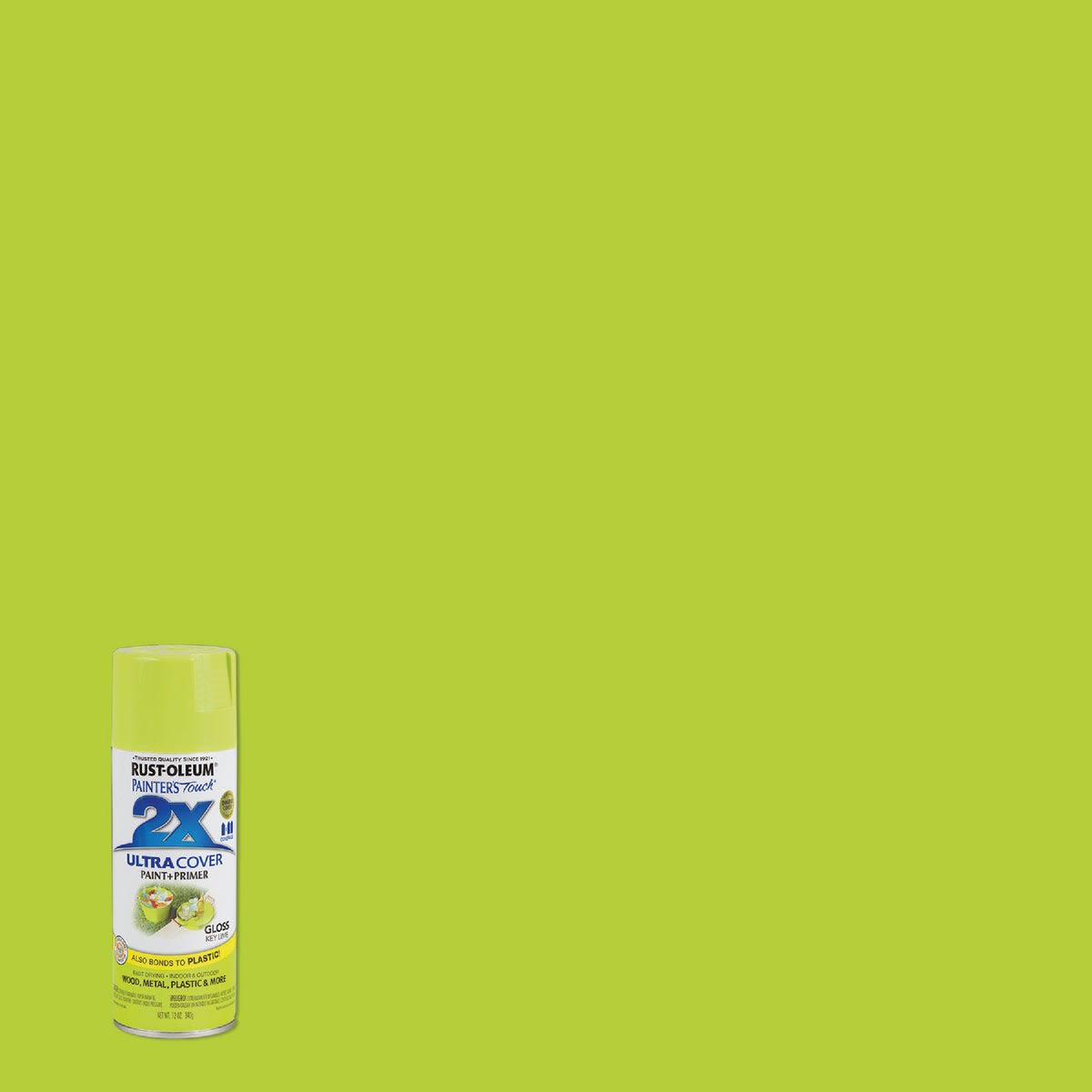 Can of key lime gloss spray paint and primer on solid green background in paint and supplies collection