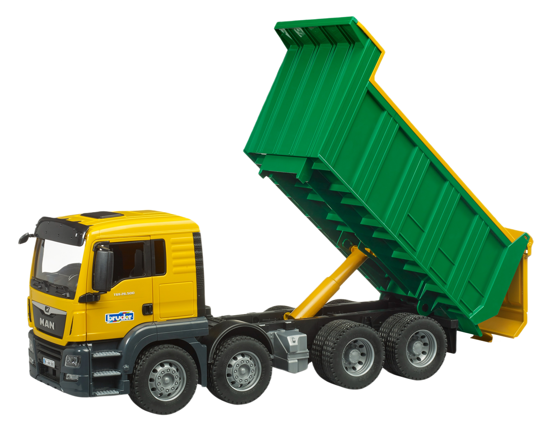 Yellow cab Bruder Man Dump Truck toy with raised green dump bed and detailed wheels for construction play