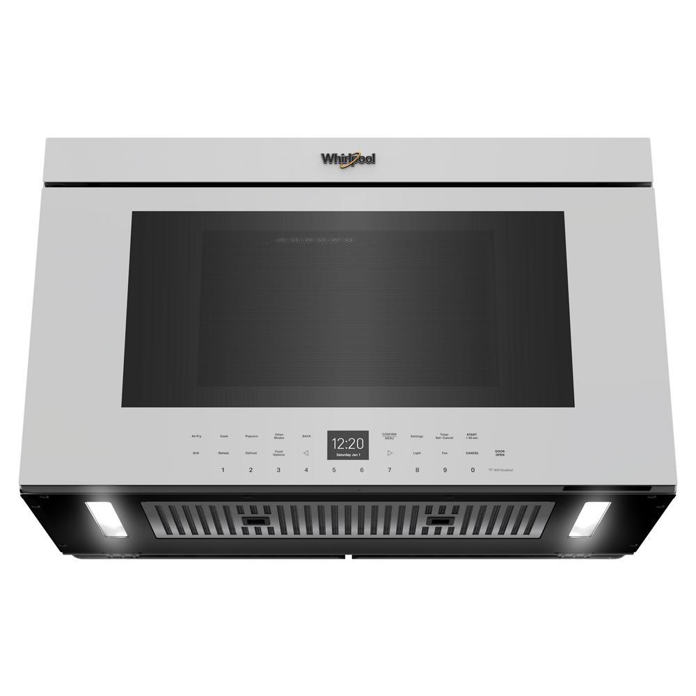 White over-the-range air fry oven with flush built-in design, digital control panel, and integrated lighting from kitchen appliances collection