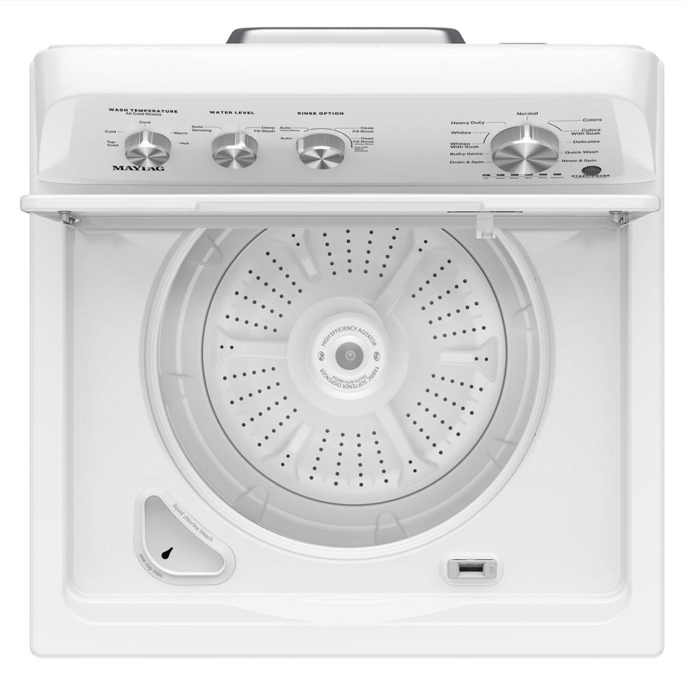 Open top load washer showing stainless steel wash tub and control panel with cycle and water level dials in appliances collection