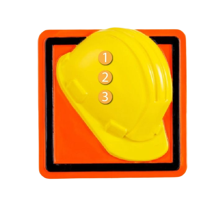 Yellow hard hat ornament resting on bright neon orange road sign base in Christmas Ornaments & Tree Decorations collection