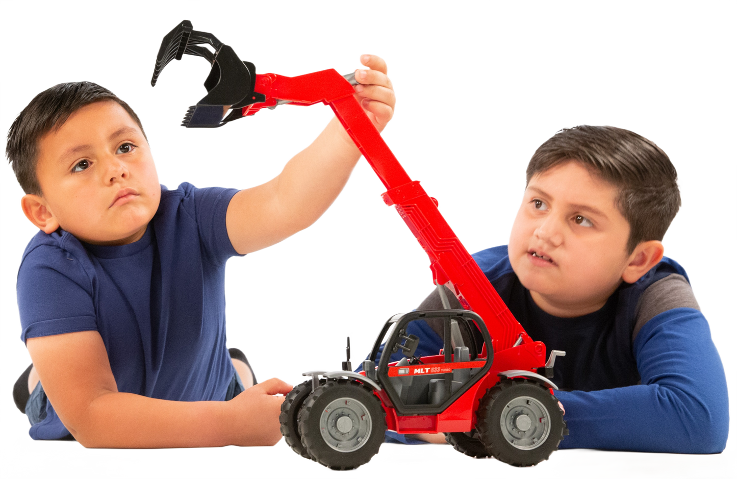 Two boys playing with a red Bruder Manitou MLT 633 Turbo Telescopic Loader toy in Vehicles & Remote Controlled Toys collection