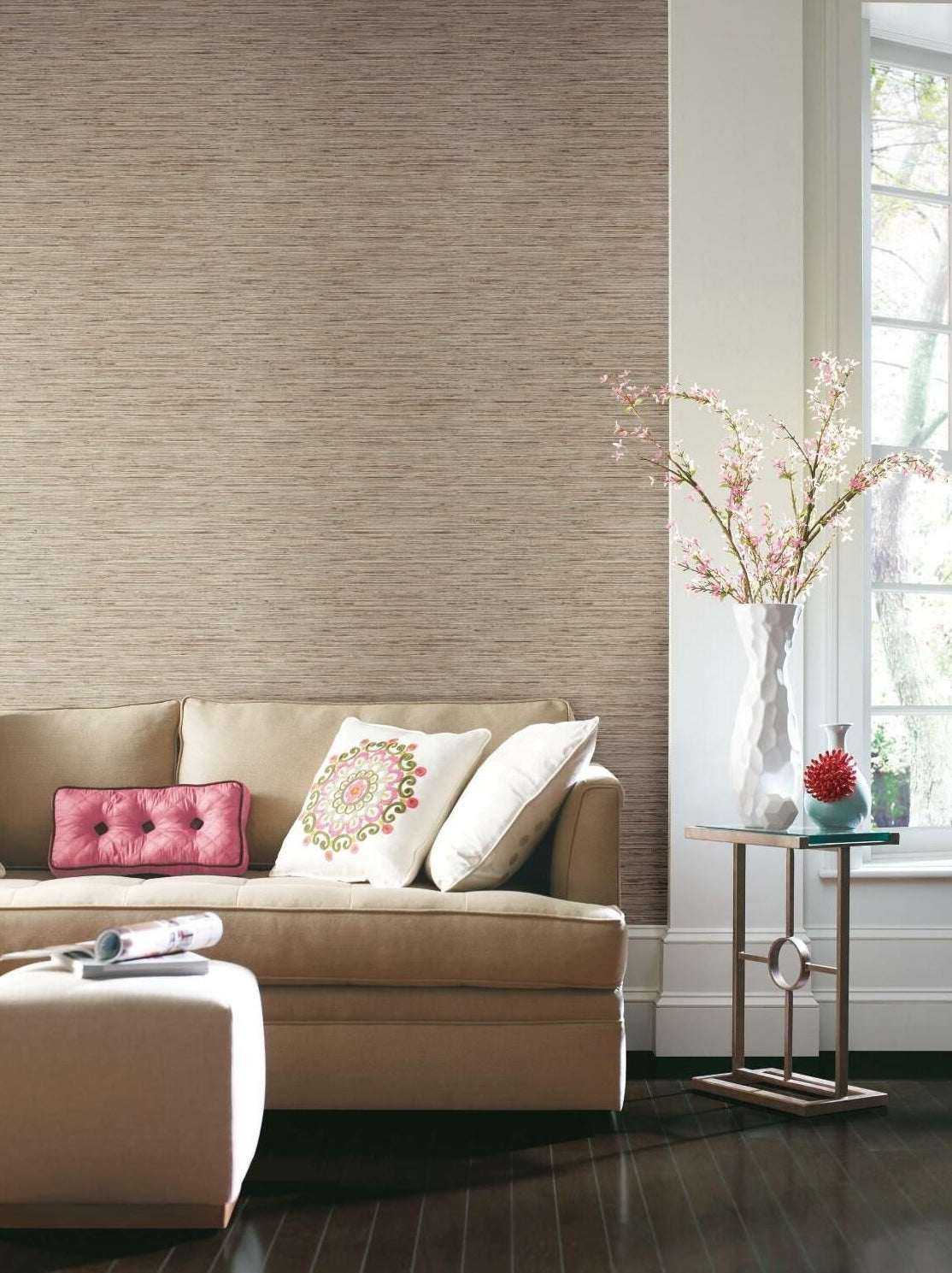 Neutral-toned peel and stick wallpaper with subtle woven texture in a cozy living room setting with natural light