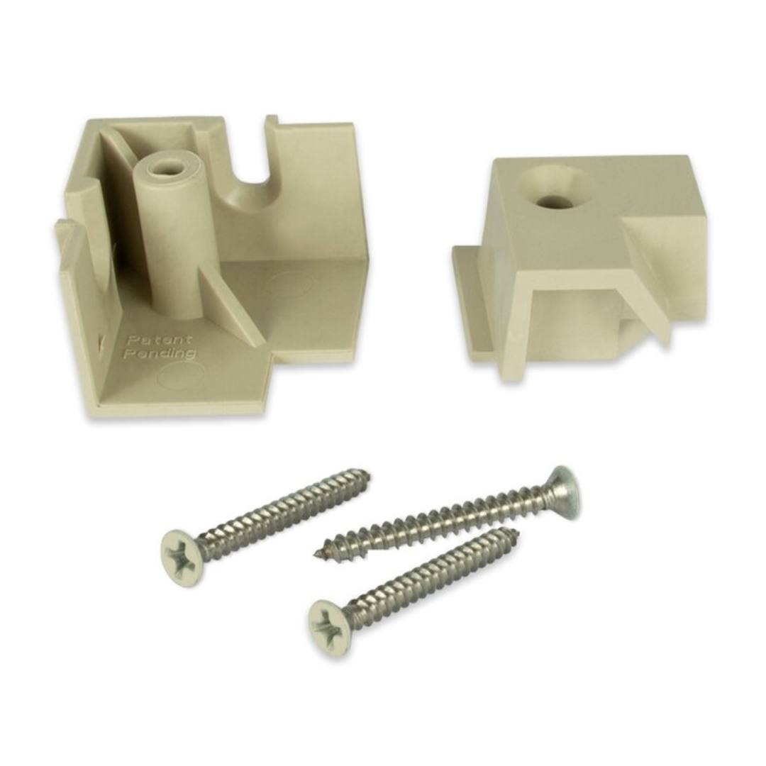 White plastic plinth flush kit components with screws for door accessories and home improvement projects
