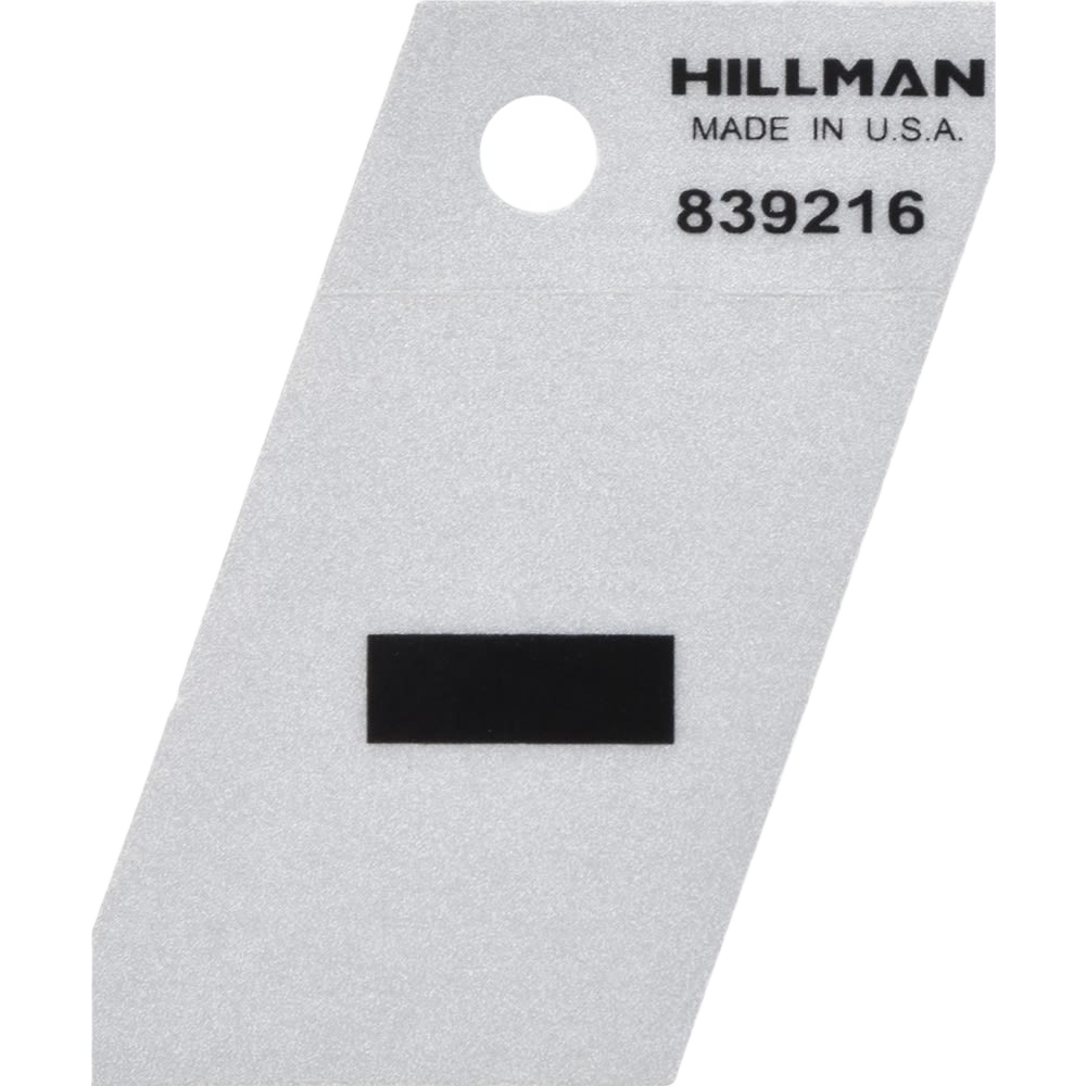Black and silver reflective hyphen sticker on branded white backing card for tools and home improvement projects