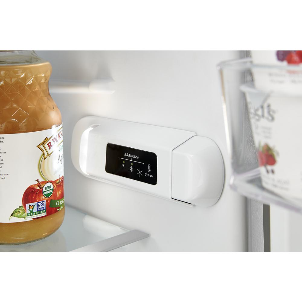 Close-up of digital temperature control panel inside white top freezer refrigerator in kitchen appliances collection