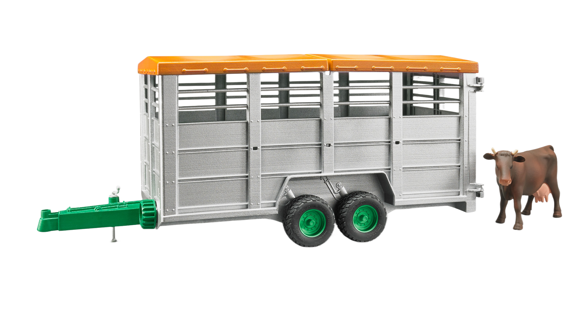 Miniature livestock trailer with orange roof and green hitch, accompanied by a brown and black toy cow figure