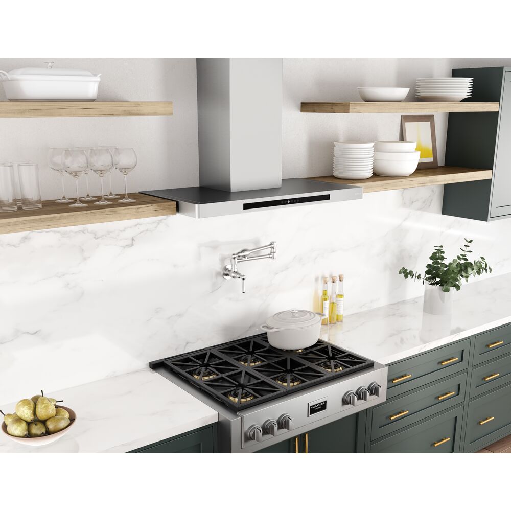 Stainless steel low-profile chimney hood with invisible touch controls above gas range in modern kitchen with marble backsplash and open shelving