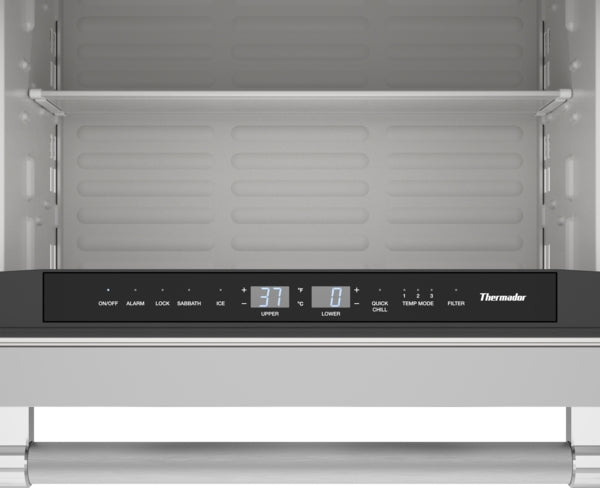 Close-up of digital control panel and upper drawer interior of stainless steel under counter combo refrigerator freezer in appliances collection