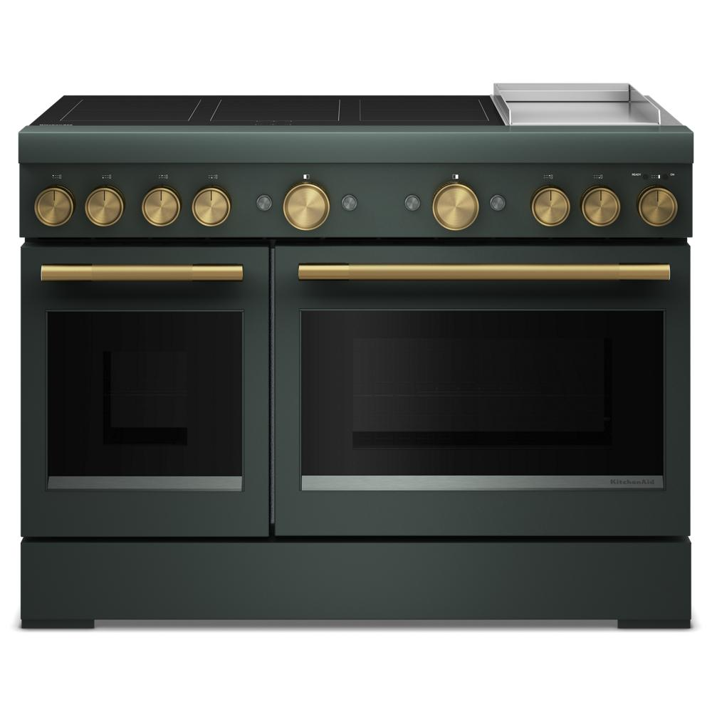 Front view of dark green induction range with six brass knobs, dual ovens, and stainless steel griddle in kitchen appliances collection