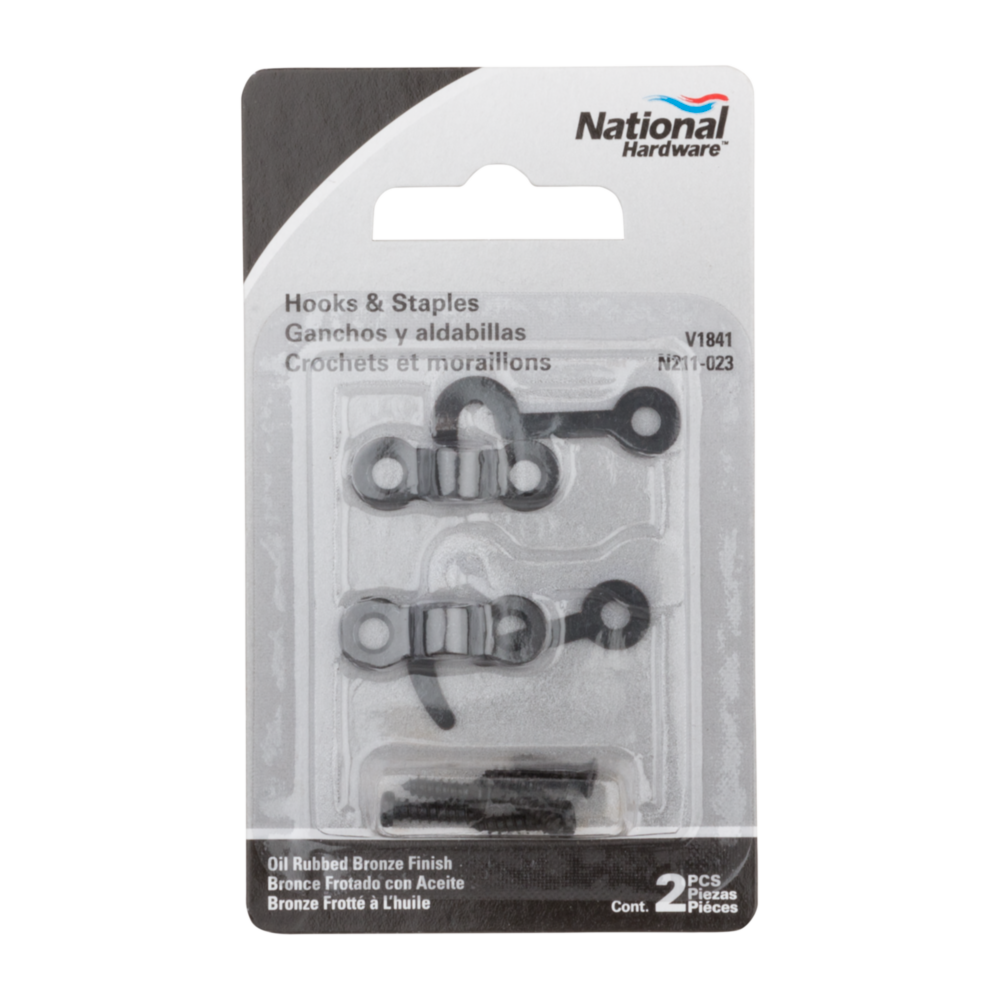 Two oil rubbed bronze miniature decorative hooks and staples with mounting screws for storage and organization projects under $50 collection
